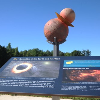 Station 4 of the Astrobiology Walk with a 3-dimension depiction of a collision between the proto-Earth and a Mars-sized protoplanet